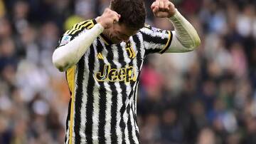 Juve's Dusan Vlahovic was left frustrated after nearly scoring in the goalless affair with Milan. (AP PHOTO)