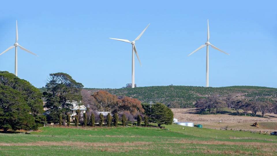 This is what the view would be across forestry land at Oberon with the proposed wind turbines. The turbines have been digitally added to the image. Picture by Chris Muldoon.
