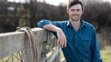 Jack Rowlandson, aka "Farmer Jack", poses by a wooden fence as an applicant for the 2025 season of Farmer Wants A Wife. Picture supplied by Channel 7