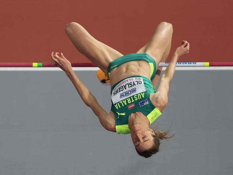 Nicola Olyslagers leaps to glory at the world indoor athletics championships in Glasgow. (EPA PHOTO)