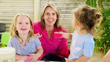 Sarah Thomas, owner of Peak Hill's Cabonne Family Day Care, with two of the children she has looked after. Picture supplied